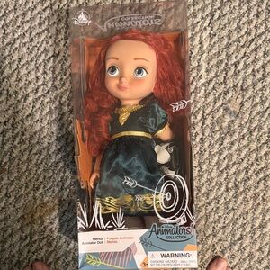 Disney Animator's Collection Doll with Red Hair and Dark Green Dress